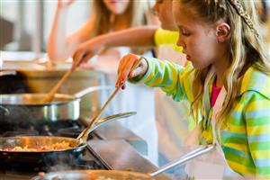 Young girl in cooking class